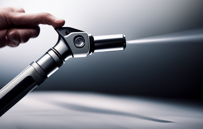 An image showcasing a close-up view of a hand gripping a wrench, effortlessly loosening the airless paint sprayer tip